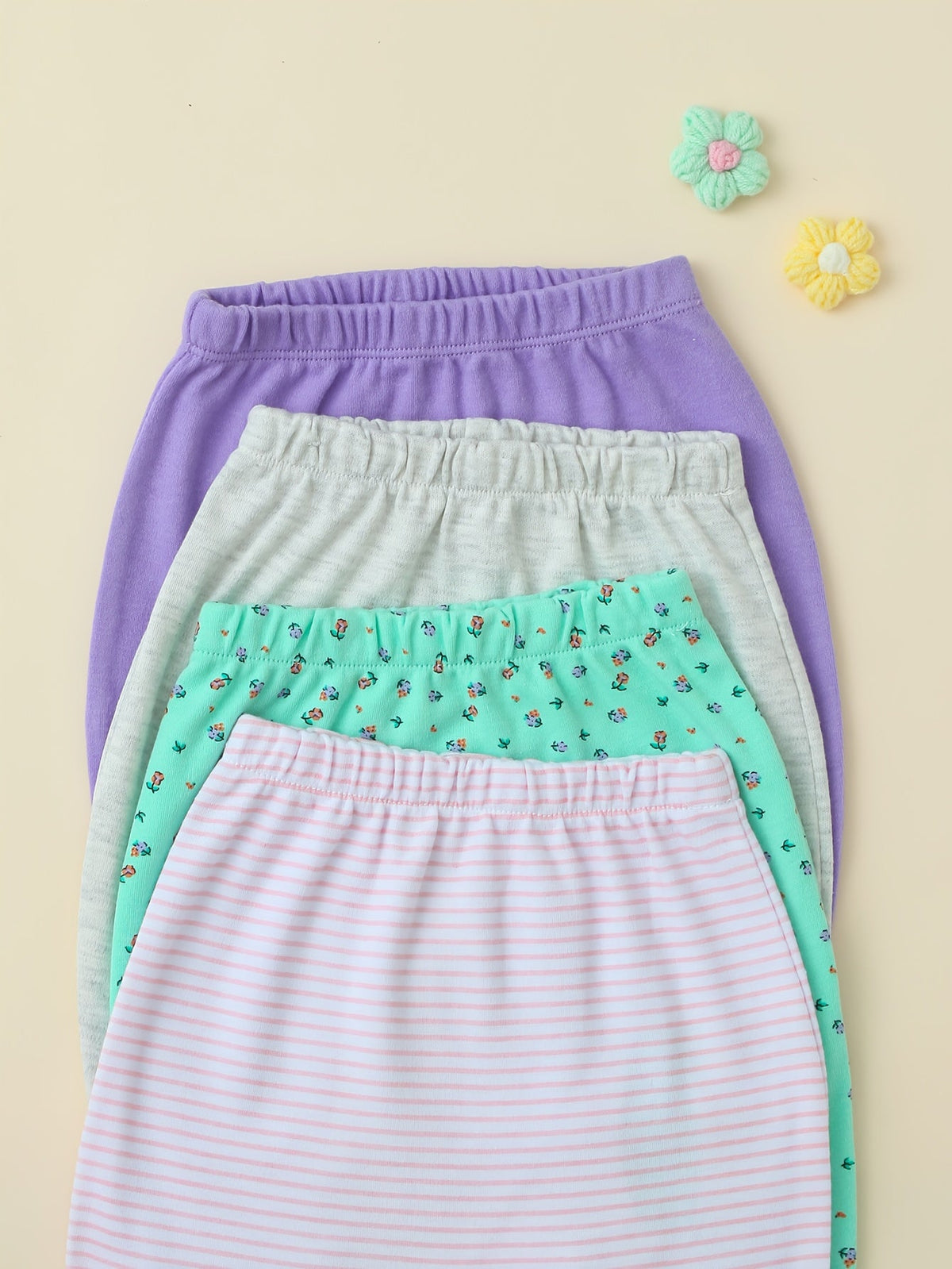 Baby Girl Pants Ten Pack in Pastel Colors with Animal Prints and Cuffed Ankles for Everyday Outfit Changes