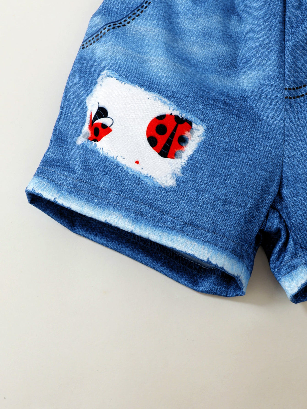 Baby Girl Ladybug Outfit Set with a Ruffle Sleeve Top and Blue Denim Look Shorts for Summer Casual Wear