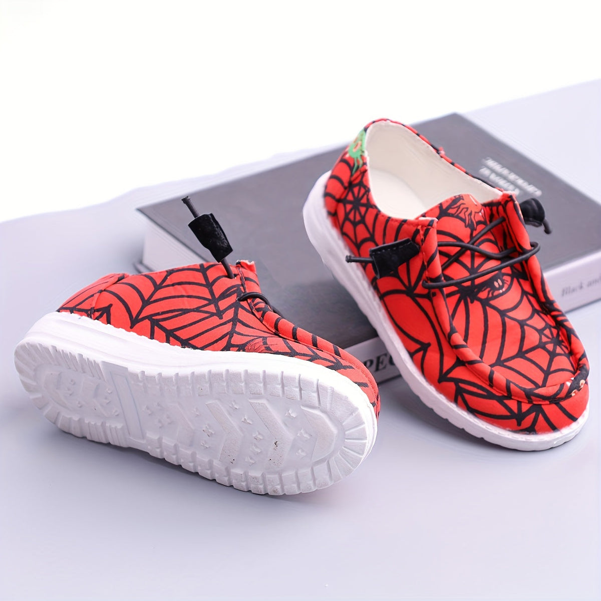 Boys' Red Printed Sneakers with Black Spiderweb Graphics and Knotted Cord Fronts for Casual Outfits