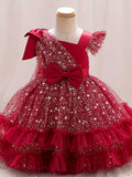 Girls' Star Tulle Party Dress with Large Bow Details and a Tiered Skirt for Birthdays and Celebrations