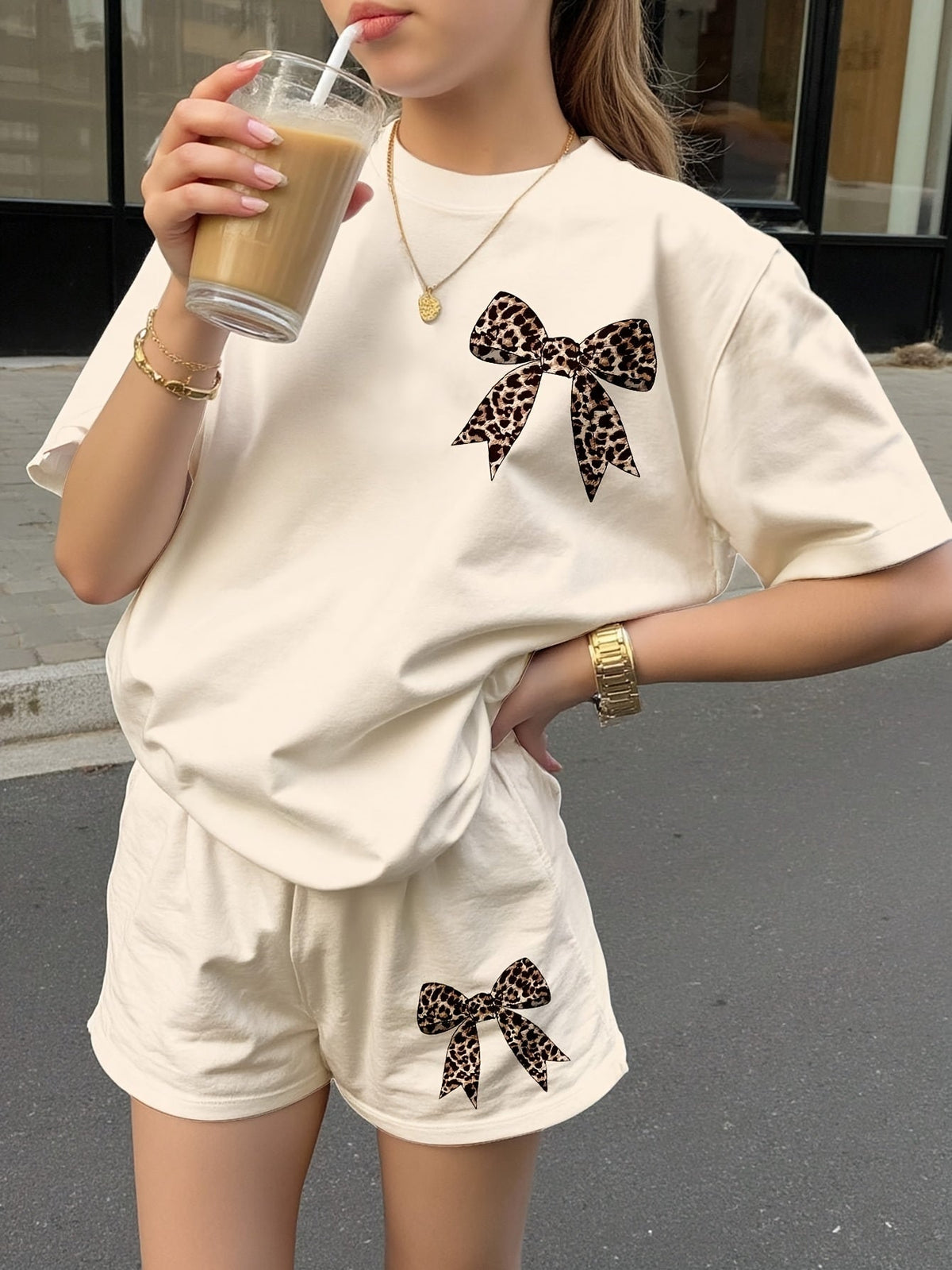 Girls' Apricot Two Piece Shorts Set with Leopard Bow Graphics and a Short Sleeve Crew Neck Top
