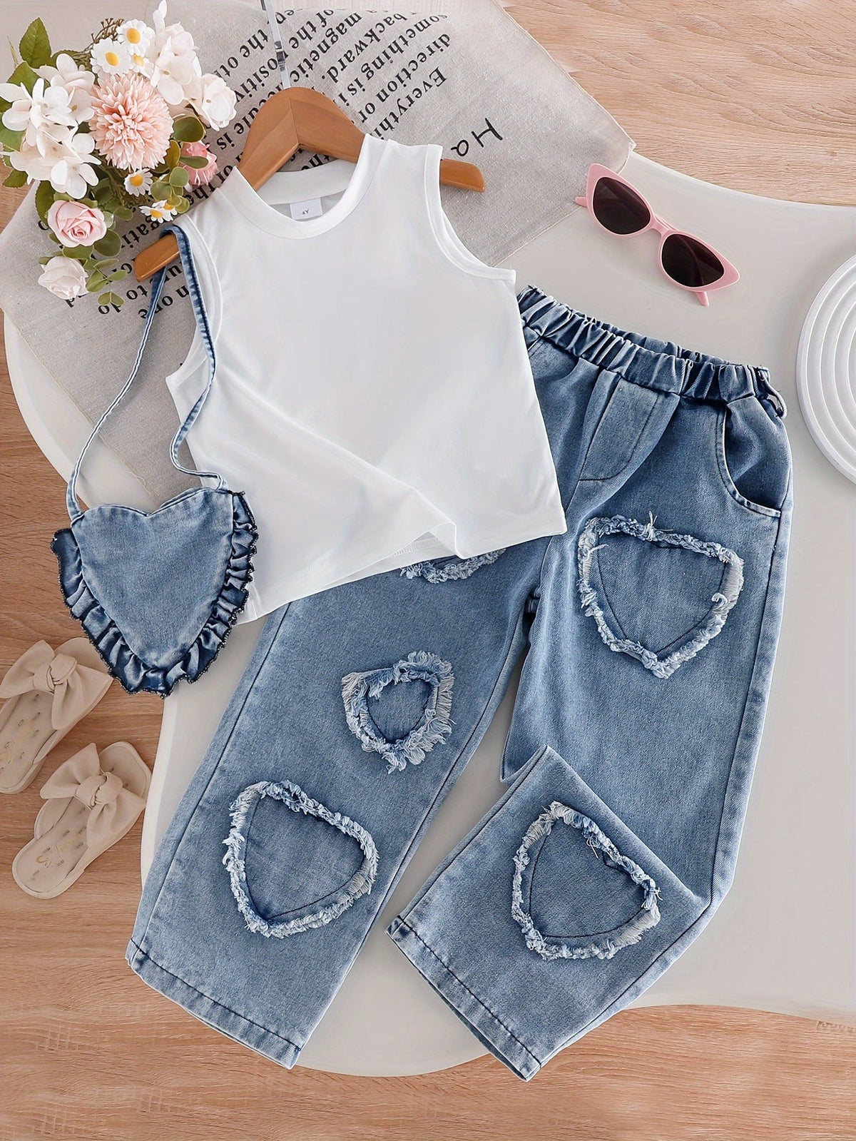 Girls White Tank Top and Heart Patch Denim Pants Outfit with a Matching Heart Bag for Casual Days