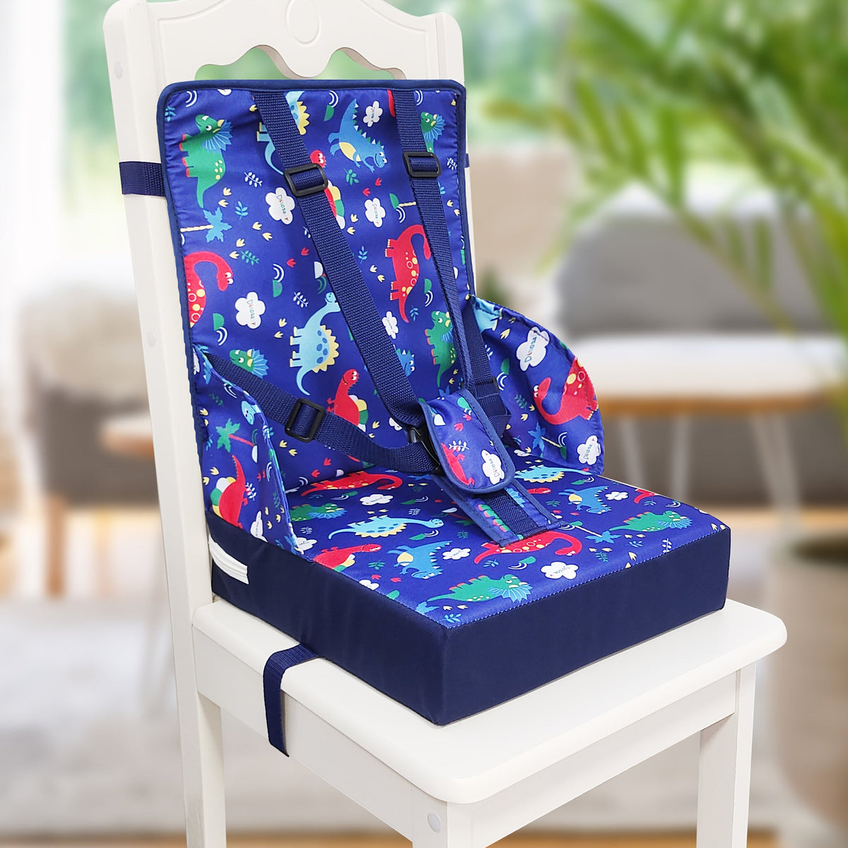 Dining Booster Seat Cushion with an Attached Back Pad and Adjustable Straps in Playful Printed Designs